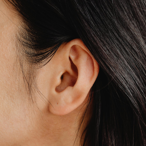 A close up of a person's ear