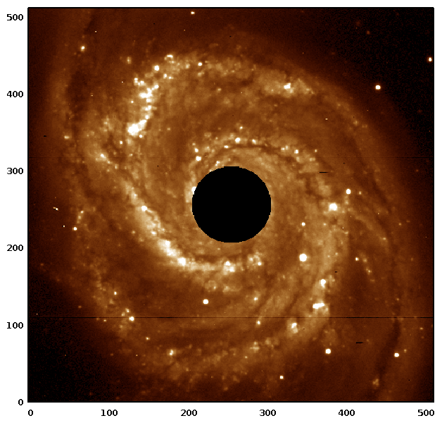 The Whirlpool Galaxy with a mask over the central bulge